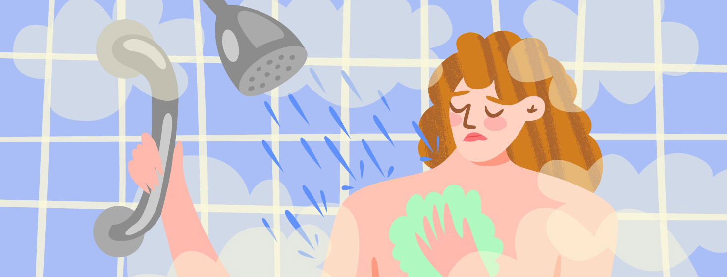 a woman in the shower with lots of steam