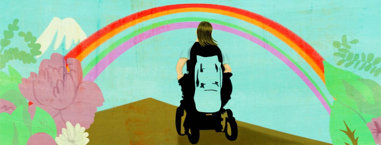 A person in a motorized wheelchair moves towards a rainbow.